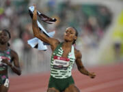 Sha'Carri Richardson reacts after winning the women's 100 meter finals during the U.S. track and field championships in Eugene, Ore., Friday, July 7, 2023.