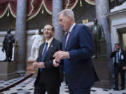 Israeli President Isaac Herzog, left, and Speaker of the House Kevin McCarthy, R-Calif., walk to a closed meeting before Herzog delivers an address to Congress in celebration of Israel's 75 years of independence, at the Capitol in Washington, Wednesday, July 19, 2023. (AP Photo/J.