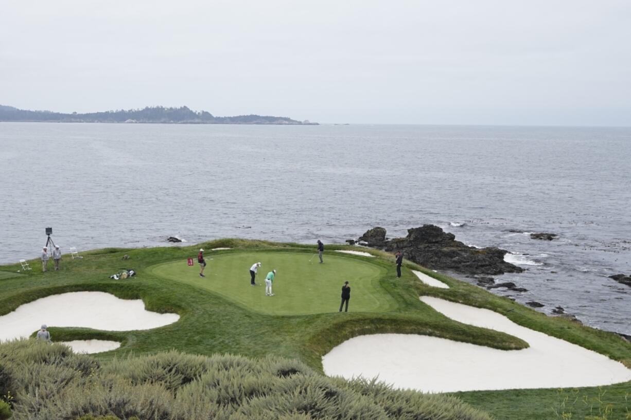 Annika Sorenstam, of Sweden, and Sadie Englemann putt on the seventh green during a practice round for the U.S. Women's Open golf tournament at the Pebble Beach Golf Links, Wednesday, July 5, 2023, in Pebble Beach, Calif.