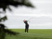 Xiyu Janet Lin, of China, hits from the fairway on the 11th hole during the first round of the U.S. Women's Open golf tournament at the Pebble Beach Golf Links, Thursday, July 6, 2023, in Pebble Beach, Calif. (AP Photo/Godofredo A.