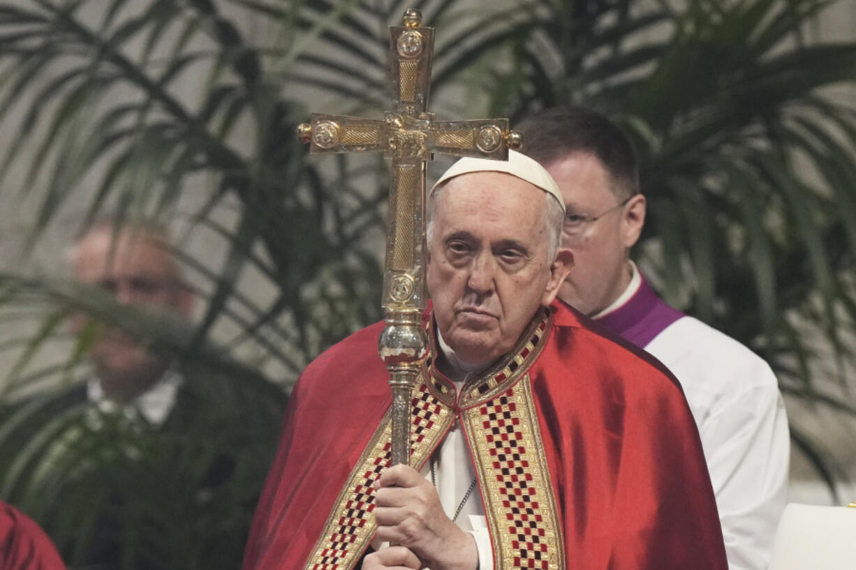 FILE - Pope Francis presides over a mass on St. Peter and Paul's Day in St. Peter's Basilica at The Vatican on June 29, 2023. The Jesuits said Monday, July 24, that a famous artist priest had been definitively expelled from the religious order for sexually, spiritually and psychologically abusing women, and lamented they couldn't prosecute him more vigorously under the Vatican's internal procedures.