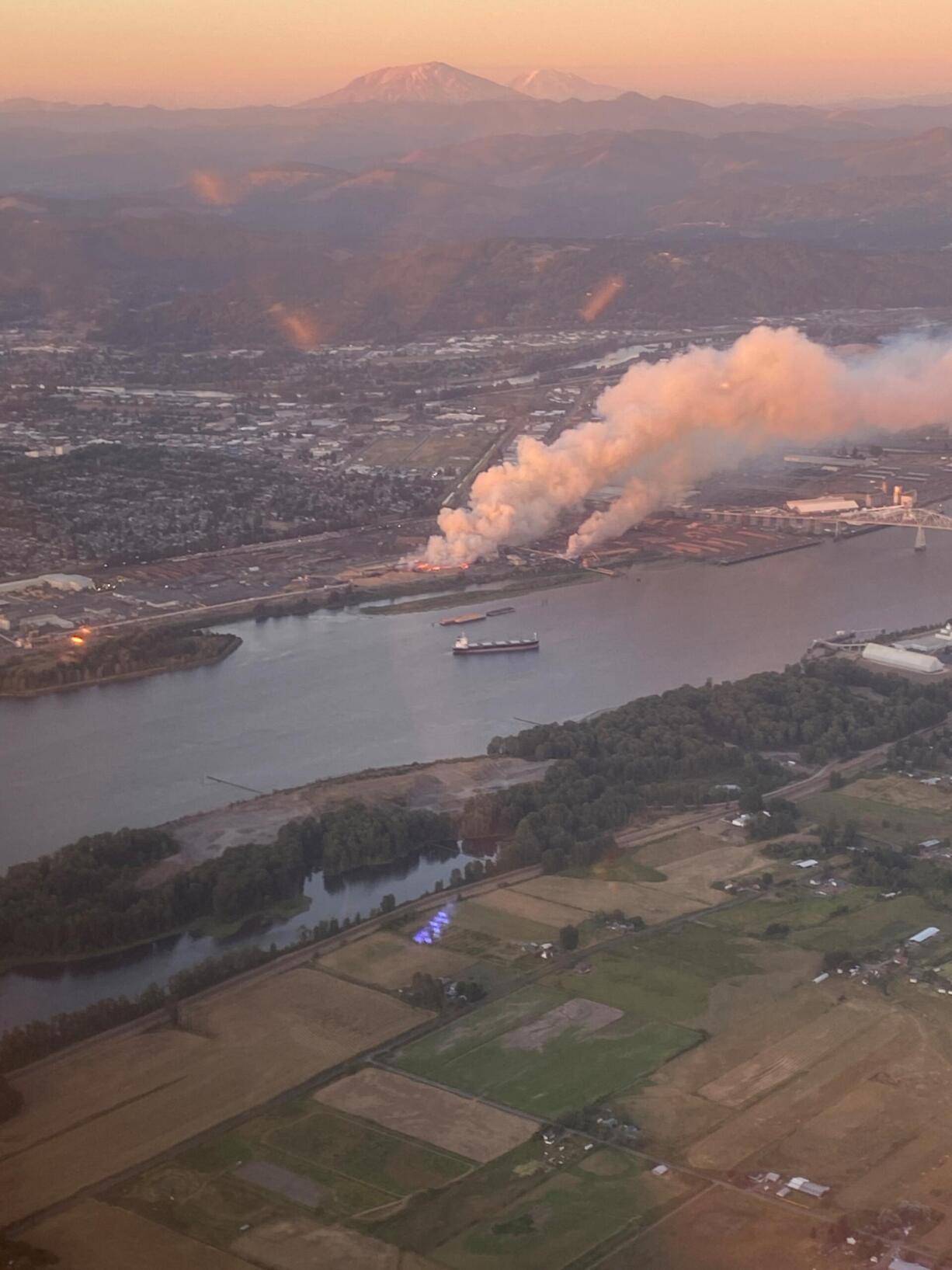 A large commercial fire in Longview spread smoke across Southwest Washington. The fire was first reported about 6:40 p.m. Tuesday evening at Nippon Dynawave Packaging off Industrial Way in Longview.