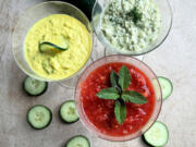 A trio of cold soups with cucumber as a main ingredient. Clockwise from left: Curried Cucumber Soup, Easy Cold Cucumber Soup, Strawberry Gazpacho.