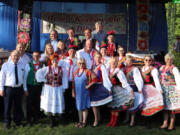 Washougal city councilor David Fritz, City Manager David Scott  and Mayor David Stuebe  pose for a photo with members of the Zielonki,  Poland, council and other community members during a festival in June.