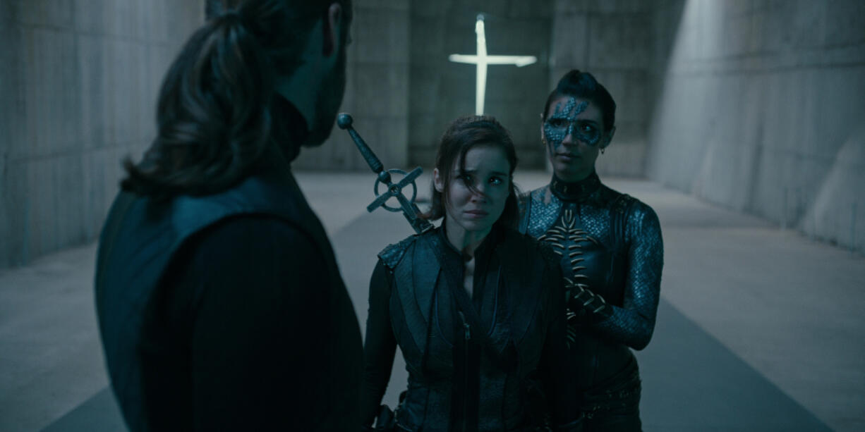 From left, William Miller, Alba Baptista and Lorena Andrea in "Warrior Nun." (Netflix)