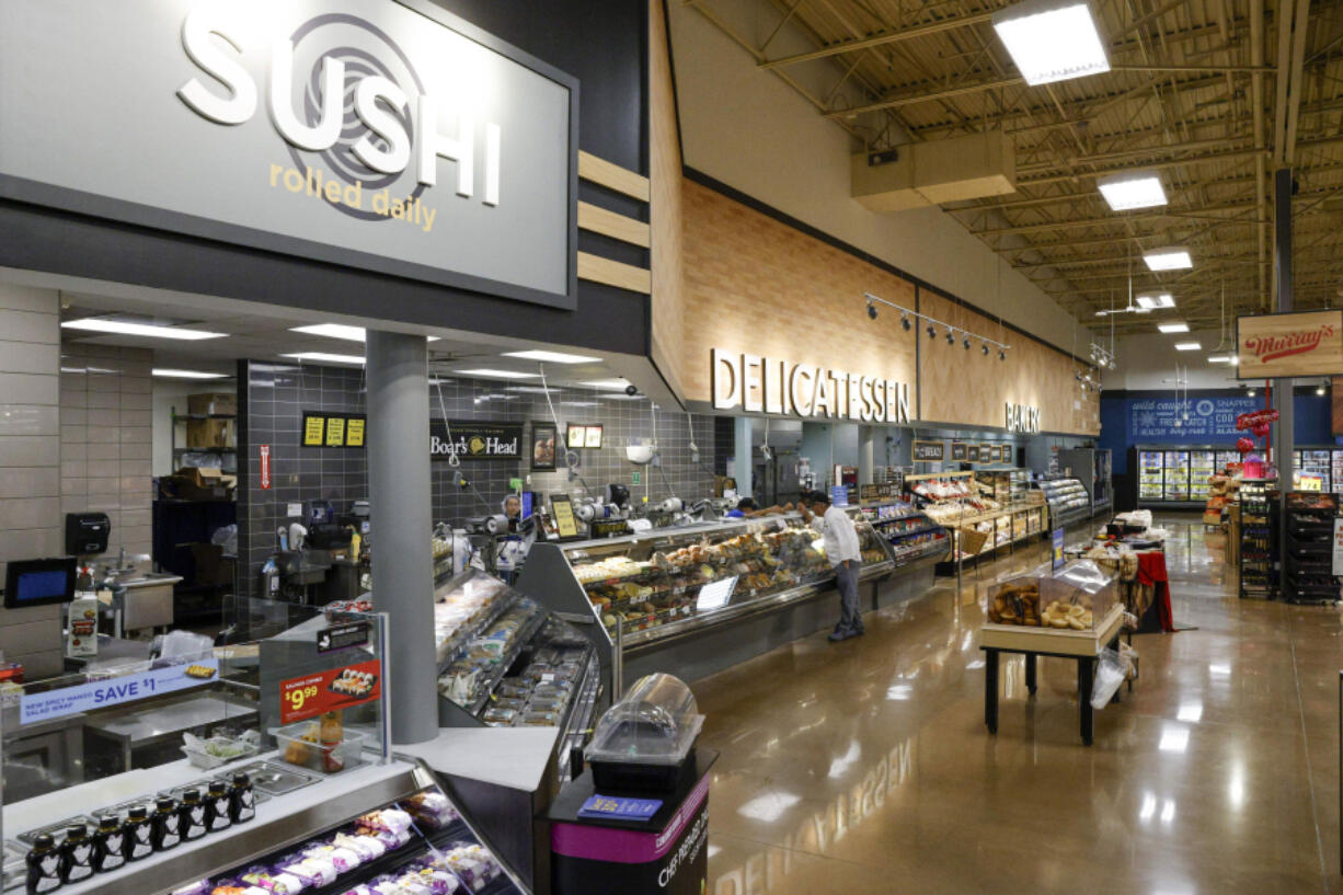 The recently remodeled sushi, deli and bakery sections are seen July 26 at a Kroger Marketplace in Frisco, Texas.