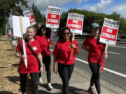 Vancouver Democratic Rep. Monica Stonier (middle) with fellow Evergreen Public Schools teachers on the picket line. (Photo courtesy Rep.