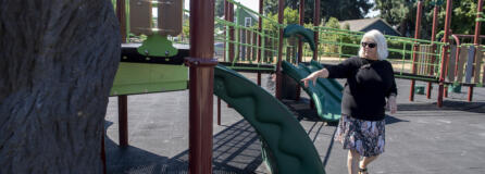 Playground designer Jane Tesner-Kleiner looks over the playground at Hough Elementary School on Wednesday morning. Bond measures in recent years have allowedVancouver Public Schools and Evergreen Public Schools to totally revamp elementary school playgrounds for both accessibility and diversity of options for play.