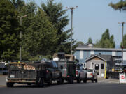 Drivers wait in line to unload their garbage and recycling at the Central Transfer and Recycling Center in Vancouver. The Clark County Council is considering purchasing the Central station, as well as the West Vancouver and Washougal transfer stations, before the end of 2027.