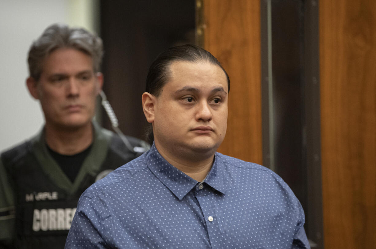 Defendant Abran Raya Leon enters the courtroom Tuesday for his felony murder trial in Clark County Superior Court. He is accused of participating in a firearms trafficking scheme with his wife, Misty Raya, and brother, Guillermo Raya Leon, who allegedly fatally shot Clark County sheriff's Sgt. Jeremy Brown.