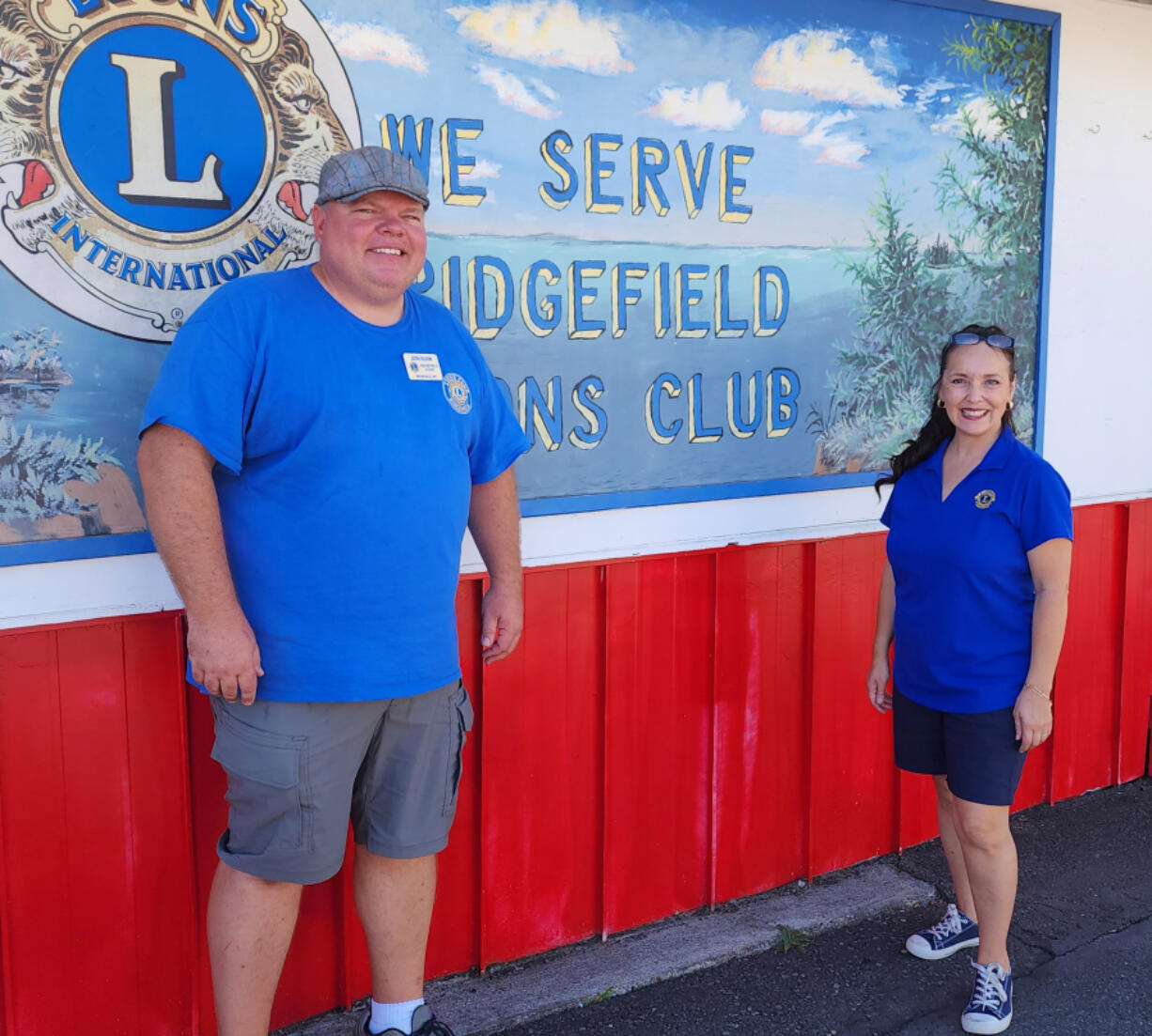 Ridgefield Lions President Josh Olson outside the Fair booth with Lisa Ikeda, Lions District 19N Governor. Ikeda resides in Puyallup.