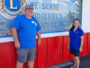 Ridgefield Lions President Josh Olson outside the Fair booth with Lisa Ikeda, Lions District 19N Governor. Ikeda resides in Puyallup.