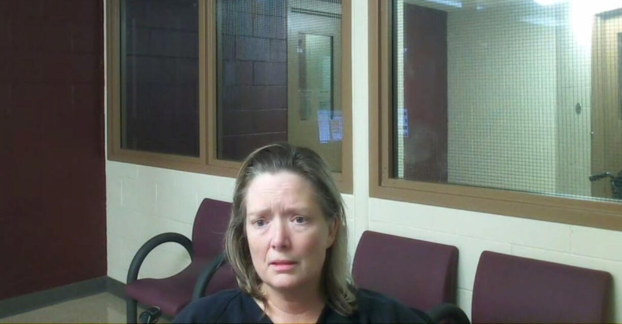 Karen Baker, 52, appears Aug. 24, 2023, in Clark County Superior Court on suspicion of vehicular homicide and driving under the influence. She's accused of driving drunk and crashing into a west Vancouver house, killing a woman inside.