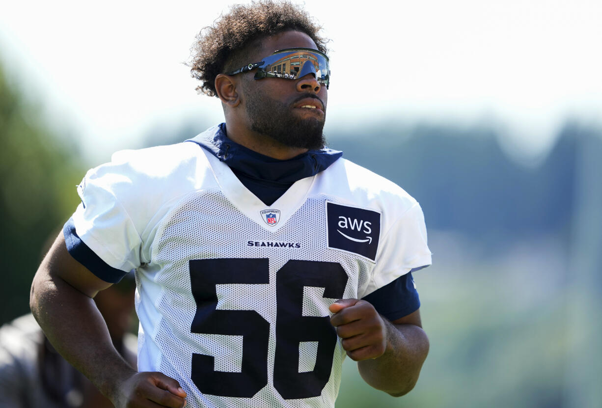 Seattle Seahawks linebacker Jordyn Brooks jogs off the field after the NFL football team's training camp Thursday, July 27, 2023, in Renton, Wash.