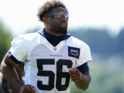 Seattle Seahawks linebacker Jordyn Brooks jogs off the field after the NFL football team's training camp Thursday, July 27, 2023, in Renton, Wash.