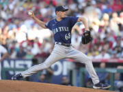 Seattle Mariners starting pitcher George Kirby (68) throws during the first inning of a baseball game against the Los Angeles Angels in Anaheim, Calif., Saturday, Aug. 5, 2023.