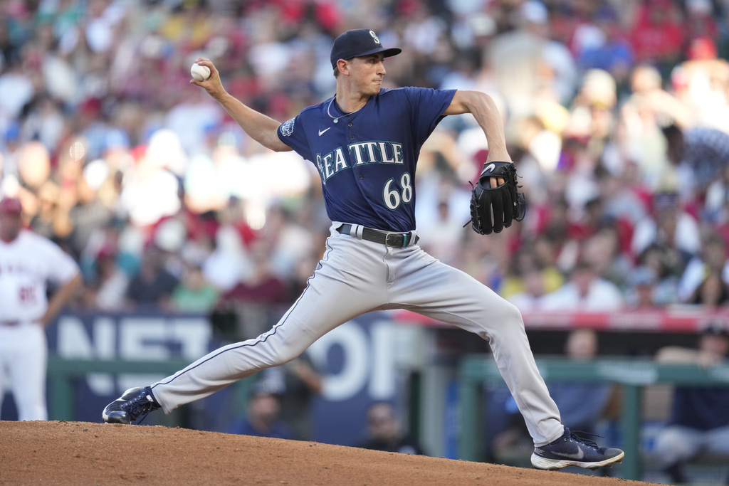 Seattle Mariners starting pitcher George Kirby (68) throws during the first inning of a baseball game against the Los Angeles Angels in Anaheim, Calif., Saturday, Aug. 5, 2023.