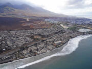 Wildfire wreckage is shown Thursday, Aug. 10, 2023, in Lahaina, Hawaii. The search of the wildfire wreckage on the Hawaiian island of Maui on Thursday revealed a wasteland of burned out homes and obliterated communities as firefighters battled the stubborn blaze making it the deadliest in the U.S. in recent years.