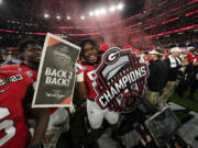 Georgia will begin its drive for an unprecedented college football championship three-peat as the No. 1 team in The Associated Press preseason Top 25 in the poll released Monday, Aug. 14, 2023.