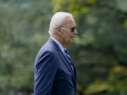 President Joe Biden walks towards the Oval Office after arriving on Marine One on the South Lawn of the White House, Monday, Aug. 14, 2023, in Washington.