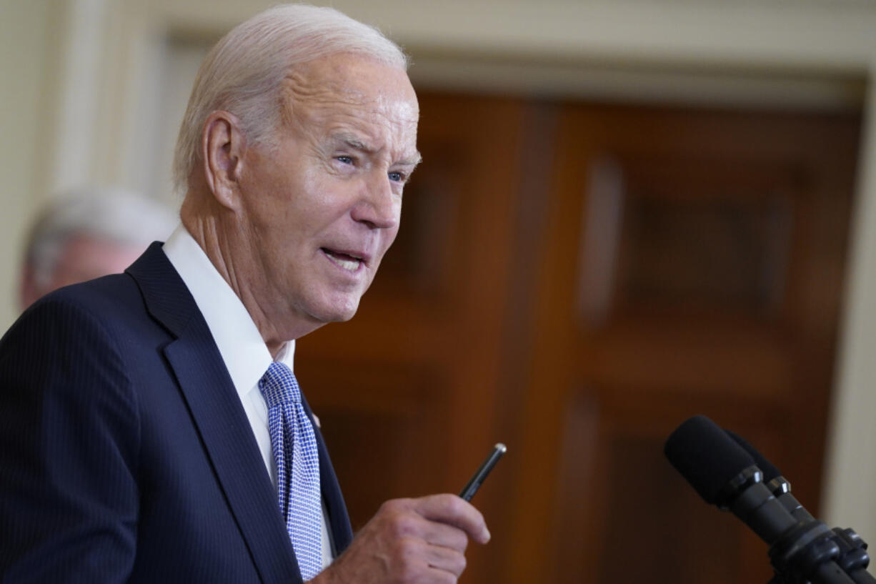 President Joe Biden speaks on the anniversary of the Inflation Reduction Act during an event in the East Room of the White House, Wednesday, Aug. 16, 2023, in Washington.