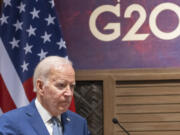 FILE - President Joe Biden pauses while speaking during a meeting with Indonesian President Joko Widodo on the sidelines of the G20 summit meeting, Monday, Nov. 14, 2022, in Bali, Indonesia. The White House announced Tuesday, Aug. 22, 2023, that President Joe Biden will attend next month's Group of 20 summit in New Delhi, India.