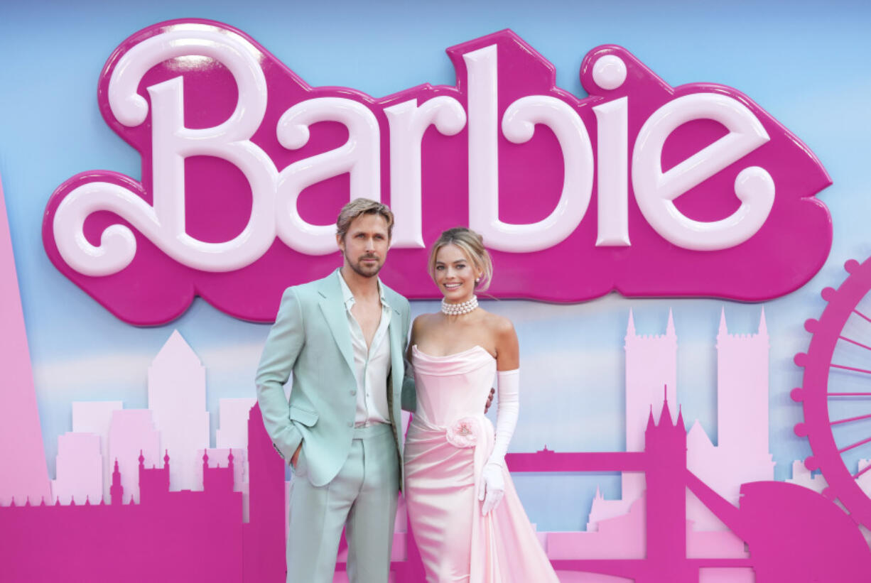 Ryan Gosling, left, and Margot Robbie pose for photographers upon arrival at the premiere of the film 'Barbie' on Wednesday, July 12, 2023, in London.