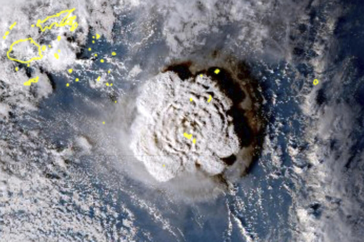 FILE - This satellite image made by the Japanese weather satellite Himawari-8 shows the eruption of the Hunga Tonga-Hunga Ha'apai undersea volcano at the Pacific nation of Tonga on Jan. 15, 2022. Scientists say by far the biggest cause of the recent extreme warming is human-caused climate change and a natural El Nino. But some say there's got to be something more.