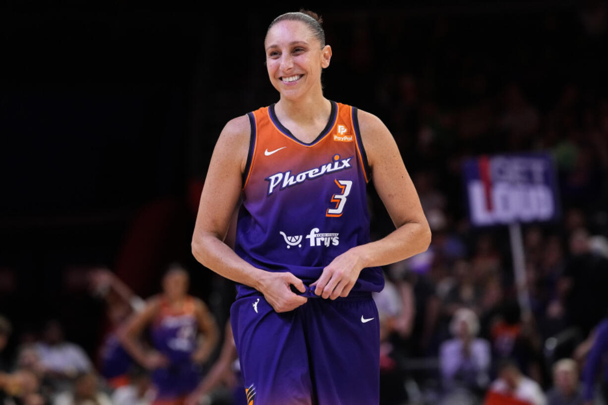 Phoenix Mercury Diana Taurasi smiles during the second half of a WNBA basketball game against the Atlanta Dream, Thursday, Aug. 3, 2023, in Phoenix.