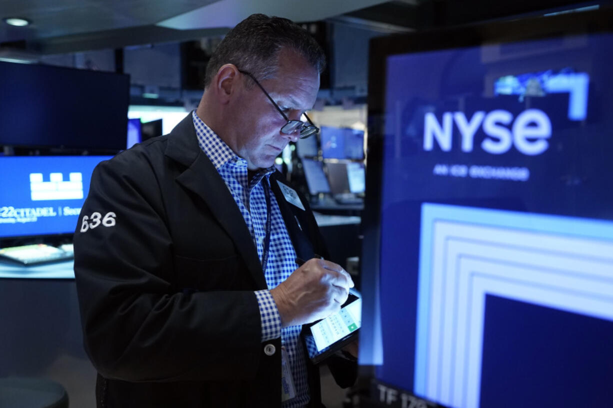 Trader Edward Curran works on the floor of the New York Stock Exchange, Wednesday, Aug. 23, 2023. Wall Street is drifting Wednesday ahead of a profit report that could show whether the frenzy this year around artificial-intelligence technology is deserved or overdone.