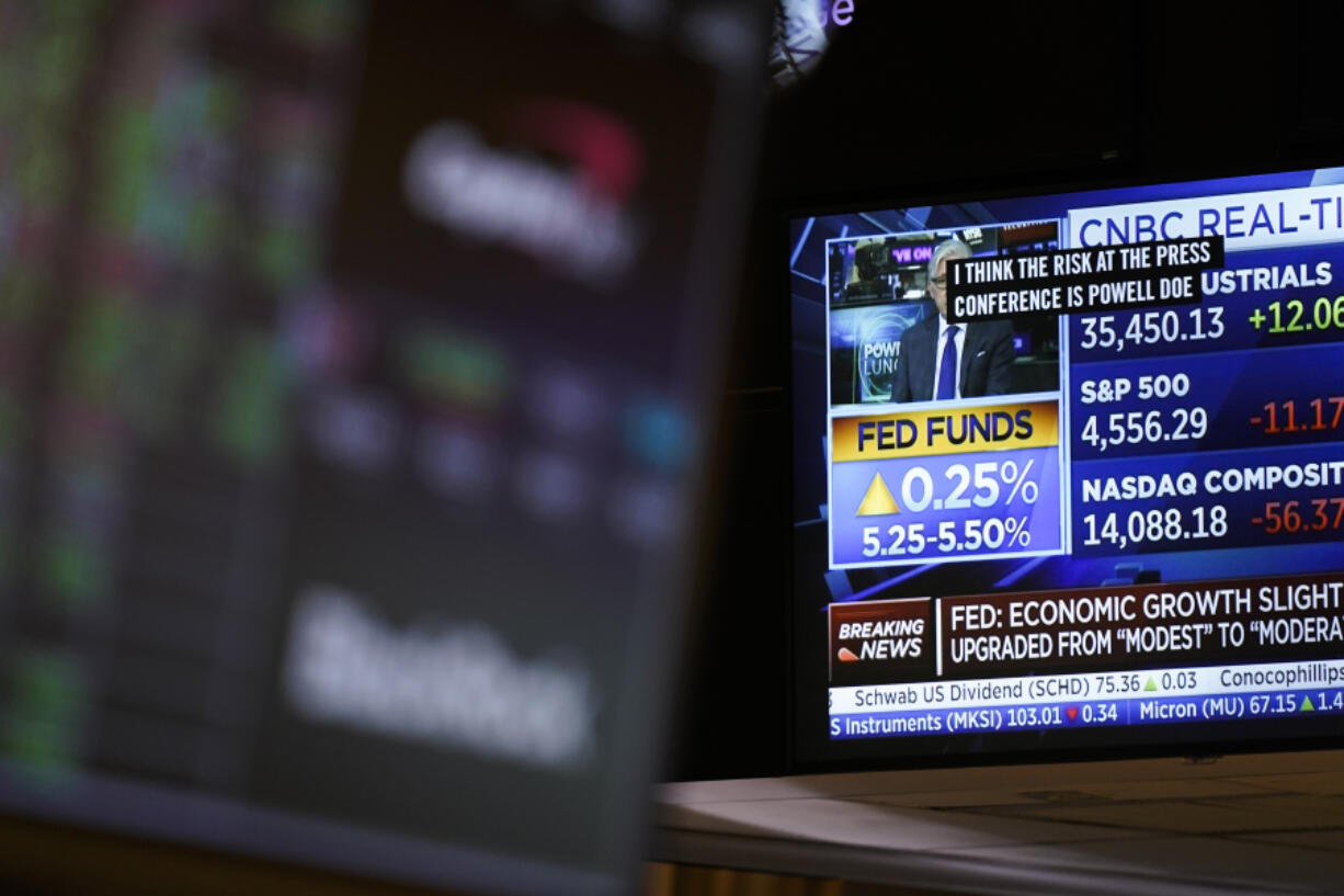 A monitor displays the raise in the interest rate on the floor at the New York Stock Exchange in New York, Wednesday, July 26, 2023. Stocks are mixed after the Federal Reserve followed through on Wall Street's expectations and raised its benchmark interest rate to its highest level in more than two decades.