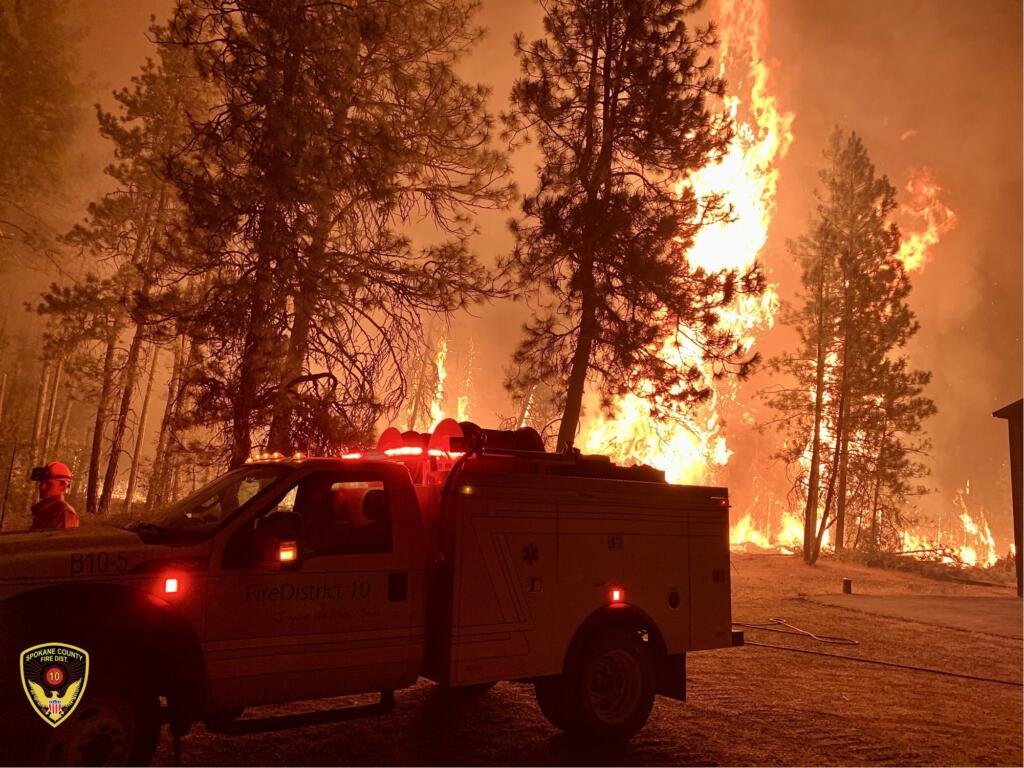 The Gray Fire burns near Spokane in August 2023.