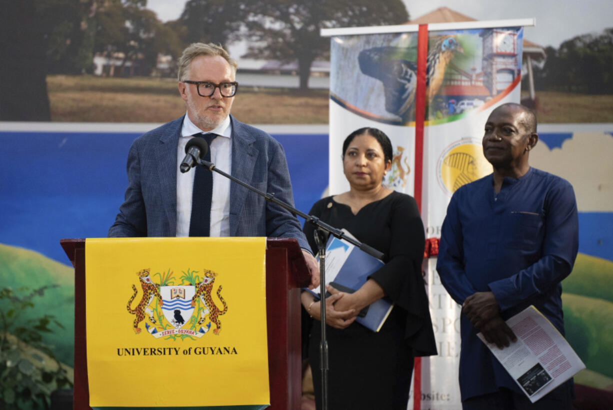 Charles Gladstone, a descendant of former plantation owner John Gladstone, delivers an apology on behalf of the Gladstone family Friday at Georgetown University in Georgetown, Guyana.