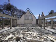 The destroyed Waiola Church is shown following wildfire, Friday, Aug. 11, 2023, in Lahaina, Hawaii. Currently, the Maui wildfires are the nation's fifth-deadliest on record, according to research by the National Fire Protection Association, a nonprofit that publishes fire codes and standards used in the U.S. and around the world.