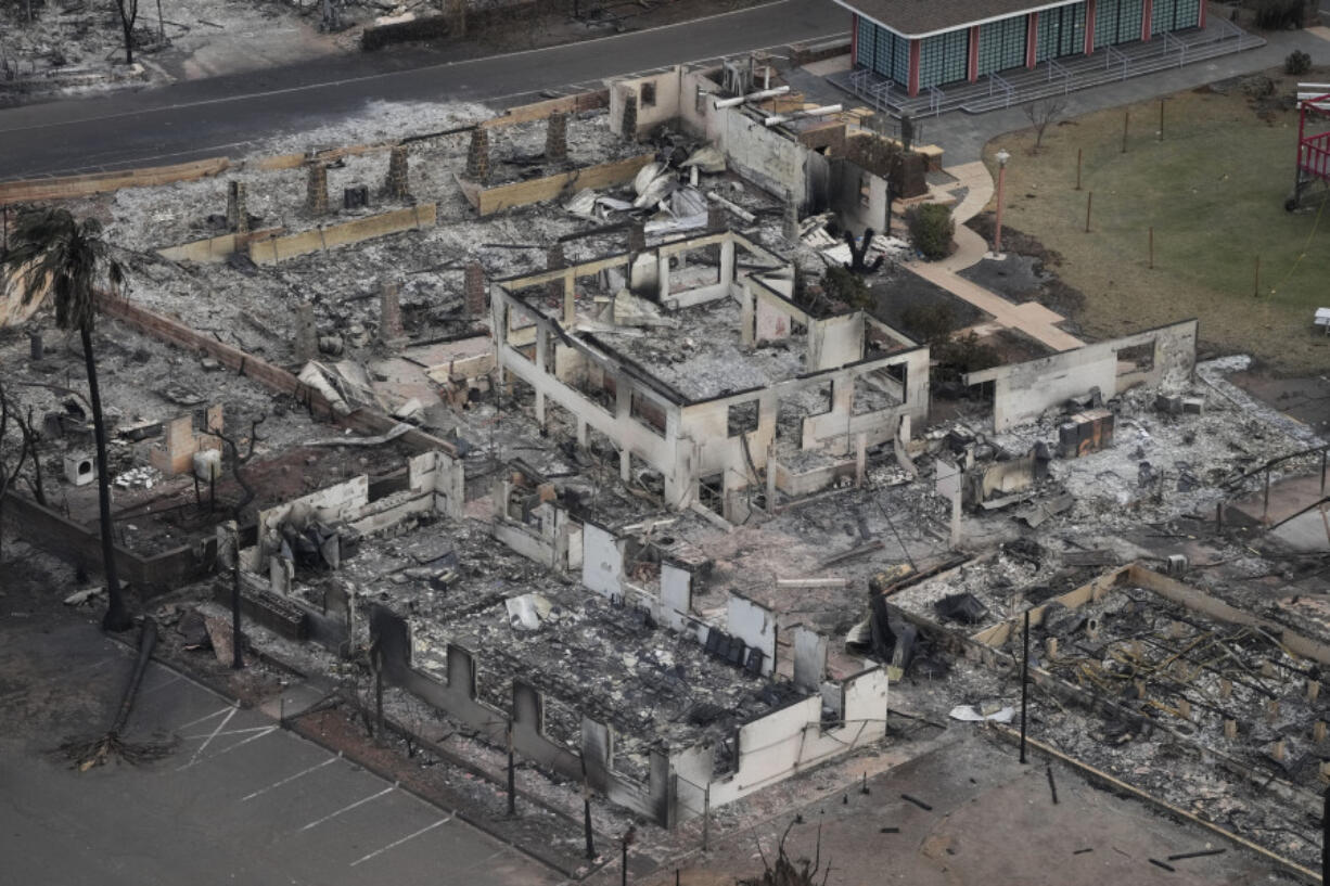 Wildfire wreckage is seen Thursday, Aug. 10, 2023, in Lahaina, Hawaii. The search of the wildfire wreckage on the Hawaiian island of Maui on Thursday revealed a wasteland of burned out homes and obliterated communities as firefighters battled the deadliest blaze in the U.S. in recent years.