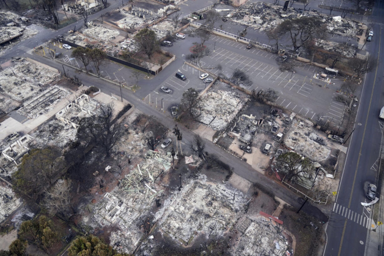 Wildfire wreckage is seen Thursday, Aug. 10, 2023, in Lahaina, Hawaii. The search of the wildfire wreckage on the Hawaiian island of Maui on Thursday revealed a wasteland of burned out homes and obliterated communities as firefighters battled the deadliest blaze in the U.S. in recent years.