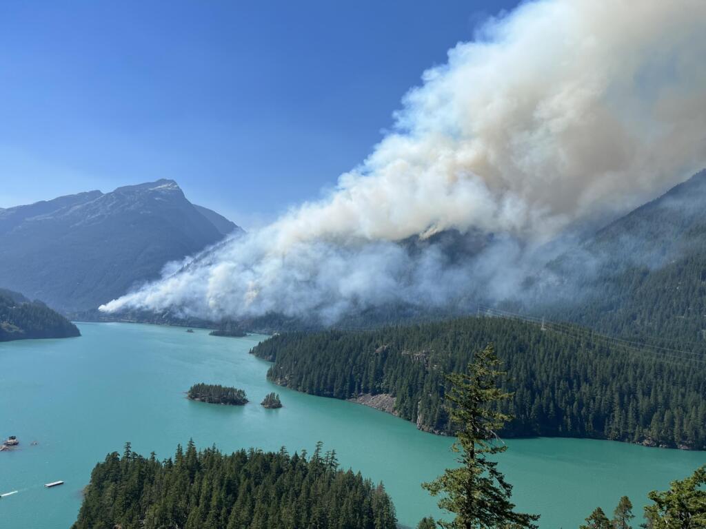 The Sourdough Fire sends a plume of smoke across Diablo Point east of Bellingham near the Canadian border earlier this month.