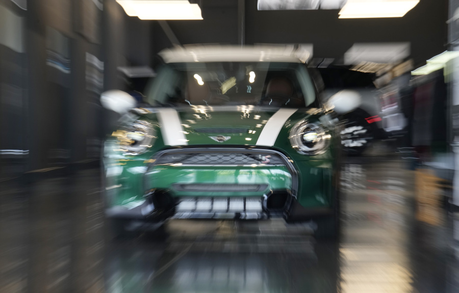 An unsold 2024 Cooper S hardtop sits in a Mini dealership Friday, July 21, 2023, in Highlands Ranch, Colo. Car insurance and repair costs have been rising sharply because new and used car prices soared amid shortages of chips and parts in the aftermath of the pandemic.