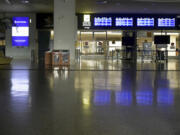 Naha airport is deserted as it is closed due to approaching typhoon in Naha, Okinawa, southern Japan, Wednesday, Aug. 1, 2023. Hundreds of flights into and out of the Naha airport, including a more than a dozen international flights connecting Seoul, Hong Kong, Taipei and Shanghai, were canceled, according to the airport.