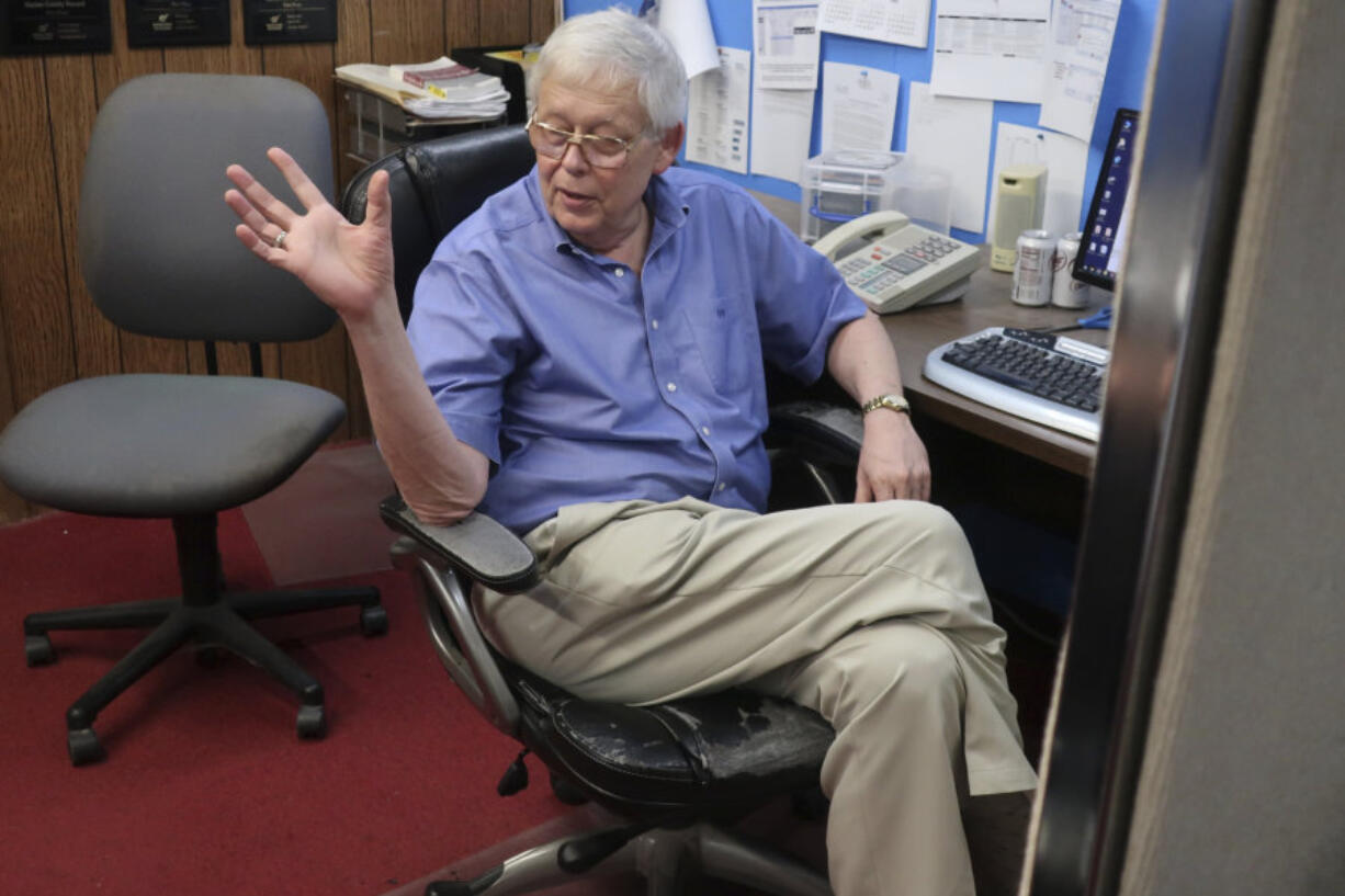 Eric Meyer, publisher of the Marion County Record, talks to one of his reporters in the weekly newspaper's newsroom, Monday, Aug. 21, 2023, in Marion, Kan. Local police raided the newspaper on Friday, Aug. 11, seizing computers and cellphones, and some of the equipment has been returned.