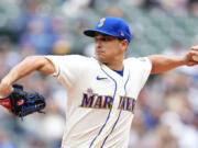 FILE - Seattle Mariners starting pitcher Marco Gonzales throws during a baseball game against the Pittsburgh Pirates, May 28, 2023, in Seattle. Left-hander Gonzales will undergo nerve surgery and will miss the rest of the season. He will have surgery Aug. 22, 2023, to decompress the anterior interosseous nerve in his left forearm. The 31-year-old hopes to recover by spring training.