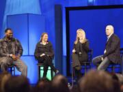 FILE - Michael Oher, left, Collins Tuohy, second from left, and Leigh Anne Tuohy, whose lives are portrayed in the Oscar-nominated movie "The Blind Side," speak with Pastor Kerry Shook, right, March 3, 2010 at Woodlands Church's Fellowship Campus in The Woodlands, TX. Michael Oher, the former NFL tackle known for the movie "The Blind Side," filed a petition Monday, Aug. 14, 2023, in a Tennessee probate court accusing Sean and Leigh Anne Tuohy of lying to him by having him sign papers making them his conservators rather than his adoptive parents nearly two decades ago. (AP Photo/The Courier, Eric S.