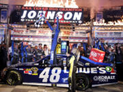 FILE - Jimmie Johnson (48) celebrates his win in a NASCAR Sprint Cup Series auto race at Texas Motor Speedway Sunday, Nov. 4, 2012, in Fort Worth. Seven-time Cup Series champion Jimmie Johnson and his former crew chief of the No. 48 Hendrick Motorsports Chevrolet Chad Knaus headline a list of 15 nominees for the NASCAR Hall of Fame Class of 2024.