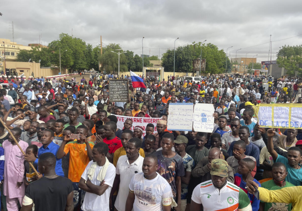 Supporters of Niger's ruling junta, gather for a protest called to fight for the country's freedom and push back against foreign interference, in Niamey, Niger, Thursday, Aug. 3, 2023. The march falls on the West African nation's independence day from its former colonial ruler, France, and as anti-French sentiment spikes, more than one week after mutinous soldiers ousted the country's democratically elected president.