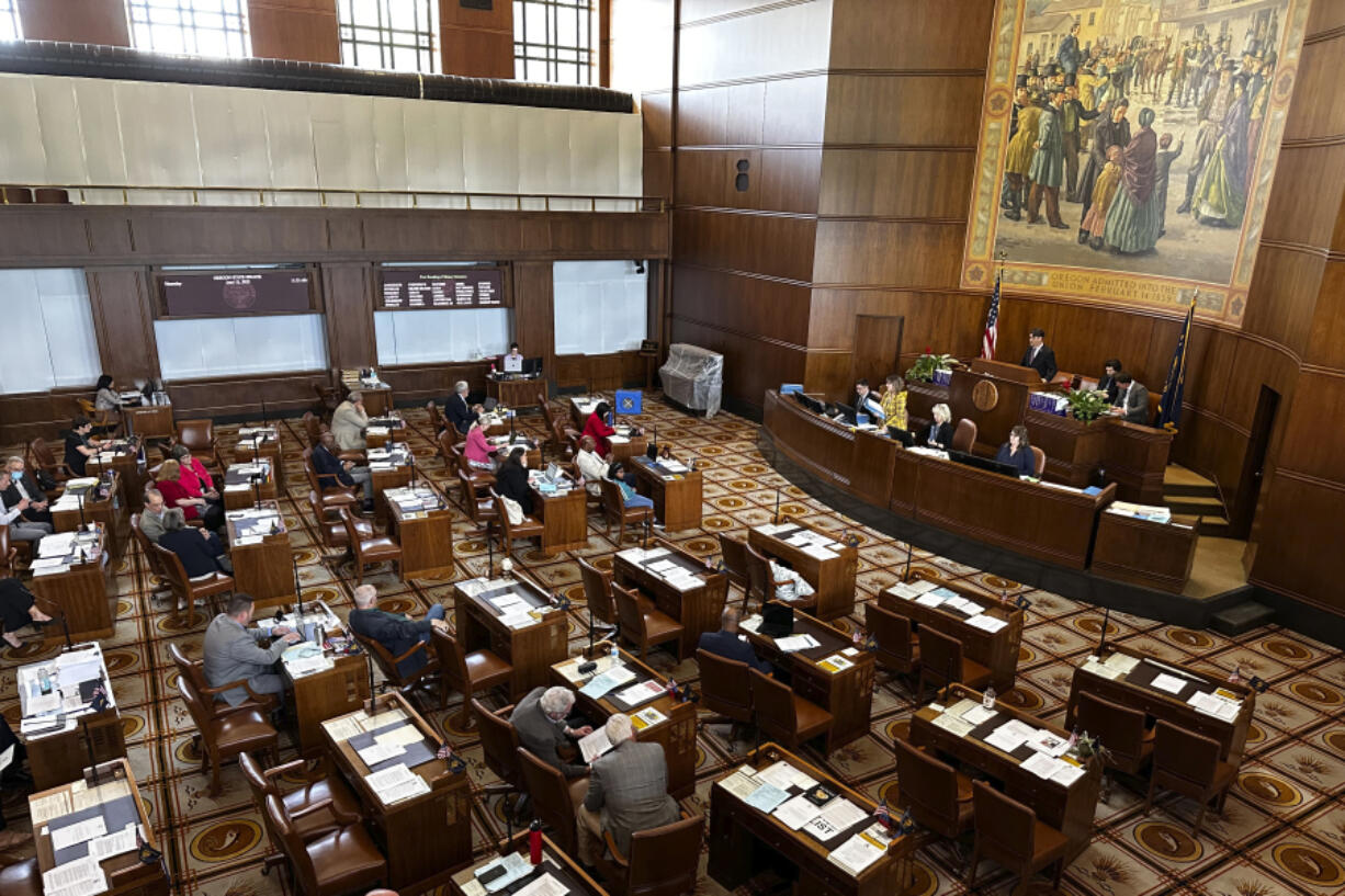 FILE - The Oregon Senate is seen in session at the state capitol in Salem, Ore., Thursday, June 15, 2023. Oregon's elections chief says the 10 Republican state senators who had more than 10 unexcused absences during the most recent GOP walkout can't run for reelection in 2024. Secretary of State LaVonne Griffin-Valade made the announcement Tuesday, Aug. 8, 2023, in a bid to clear up confusion over reelection rules following the 2023 walkout.