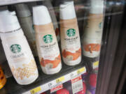 Starbucks' Pumpkin Spice Latte coffee creamers are displayed at a Target store, Wednesday, Aug. 23, 2023, in New York. The latte that made pumpkin spice a star is turning 20. And unlike the autumn days it celebrates, there seems to be no chill in customer demand. Starbucks' Pumpkin Spice Latte goes on sale Thursday in the U.S. and Canada. It's the coffee giant's most popular seasonal beverage, with hundreds of millions sold since its launch in 2003.