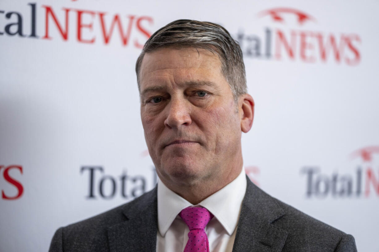 FILE - Rep. Ronny Jackson, R-Texas, speaks during a interview at the Conservative Political Action Conference, CPAC 2023, on March 4, 2023, at National Harbor in Oxon Hill, Md. Police video released Monday, Aug. 14, 2023, shows Jackson, the former White House physician, being taken to the ground by officers, profanely berating them and threatening to report them to the governor during an altercation at a rodeo last month.