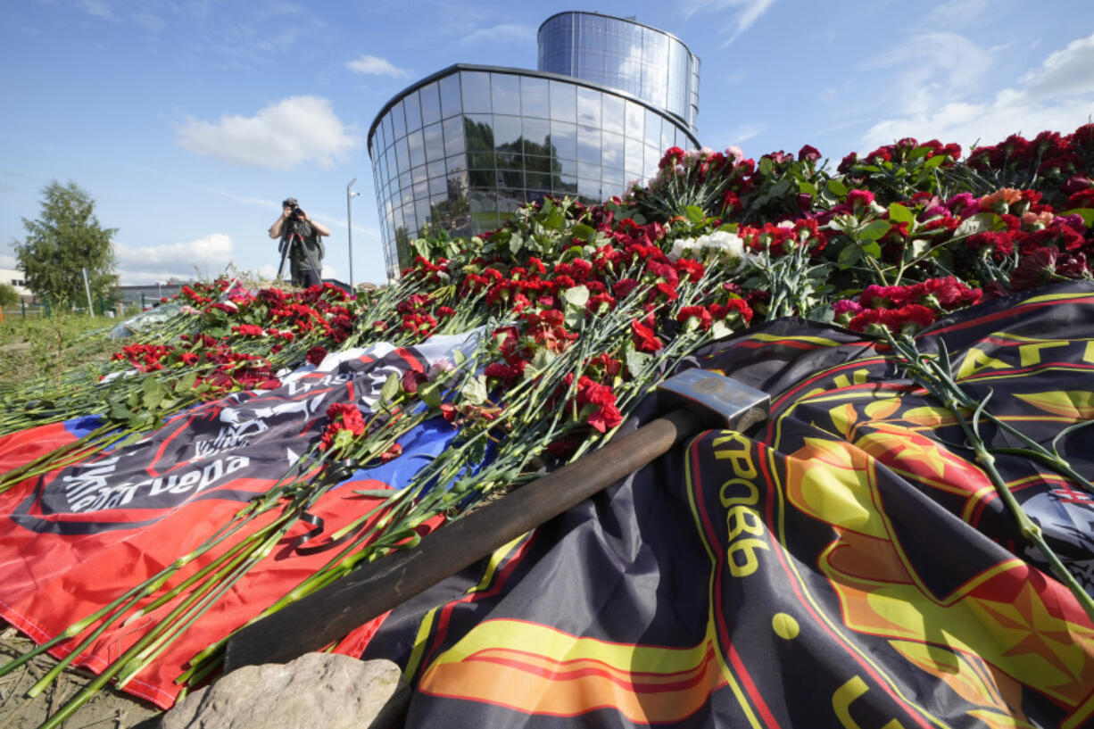 A sledgehammer, one of the symbols of PMC Wagner lies at an informal memorial next to the former 'PMC Wagner Centre' in St. Petersburg, Russia, Thursday, Aug. 24, 2023. Russian mercenary chief Yevgeny Prigozhin and some of his top lieutenants were presumed dead in a plane crash.