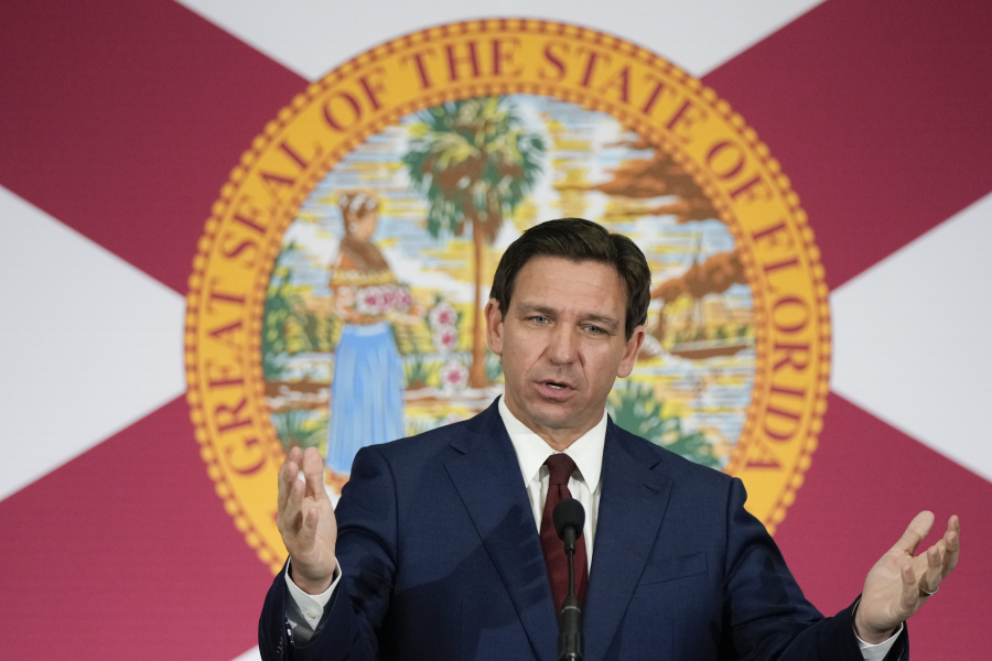 FILE - Florida Gov. Ron DeSantis speaks during a news conference, May 9, 2023, in Miami. On Saturday, Aug. 26, DeSantis declared a state of emergency for most of Florida's Gulf coast as forecasters say a weather system off the coast of Mexico could soon become a tropical storm and start moving toward the area.