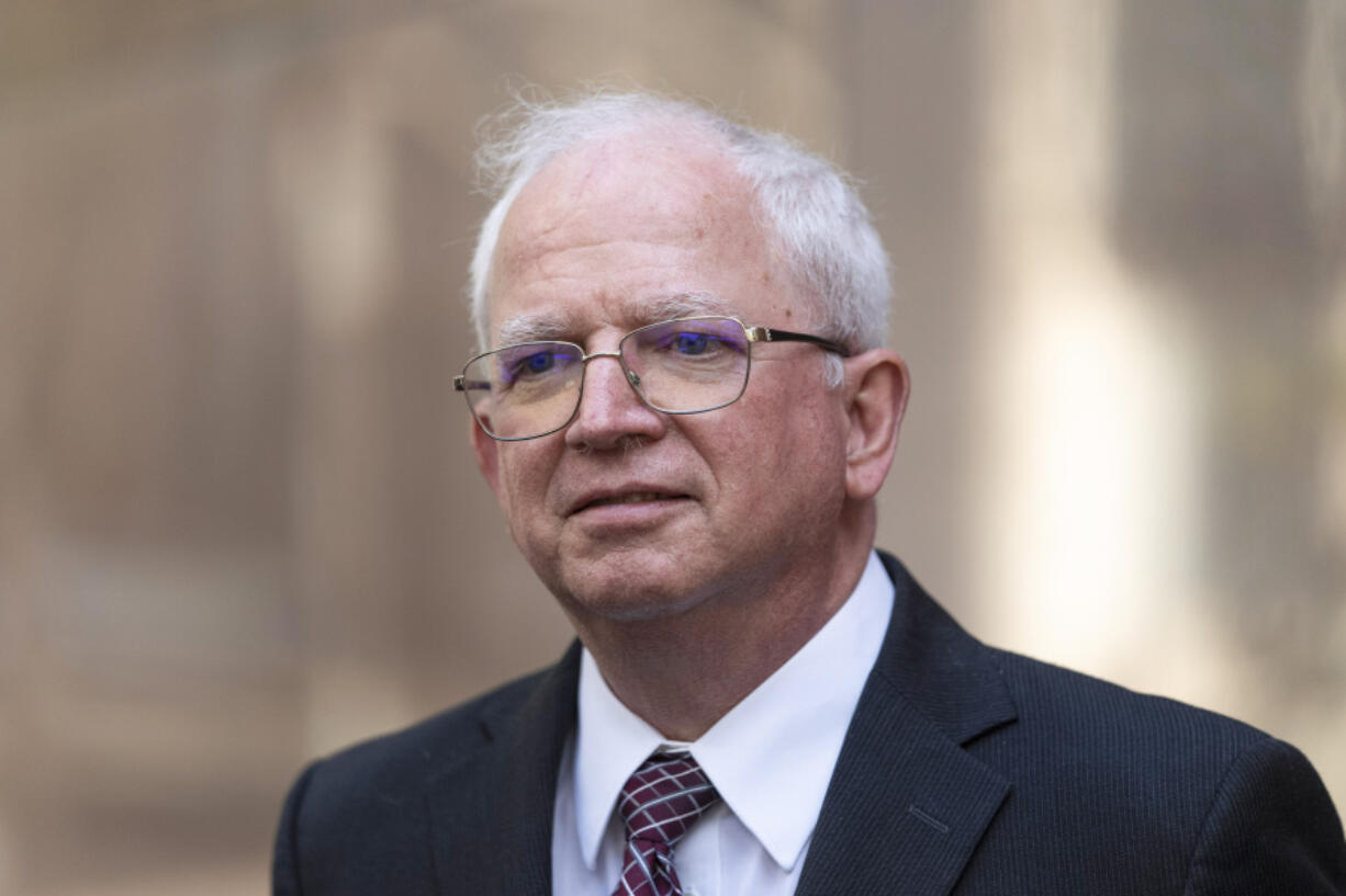 FILE - Attorney John Eastman, the architect of a legal strategy aimed at keeping former President Donald Trump in power, talks to reporters after a hearing in Los Angeles, June 20, 2023. (AP Photo/Jae C.